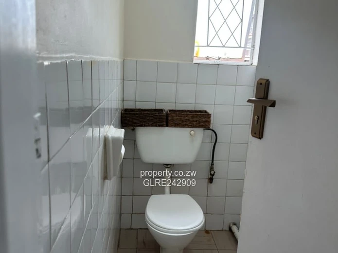 Mabelreign 3-BR House — Tiled Living, Verandah & Water Tank