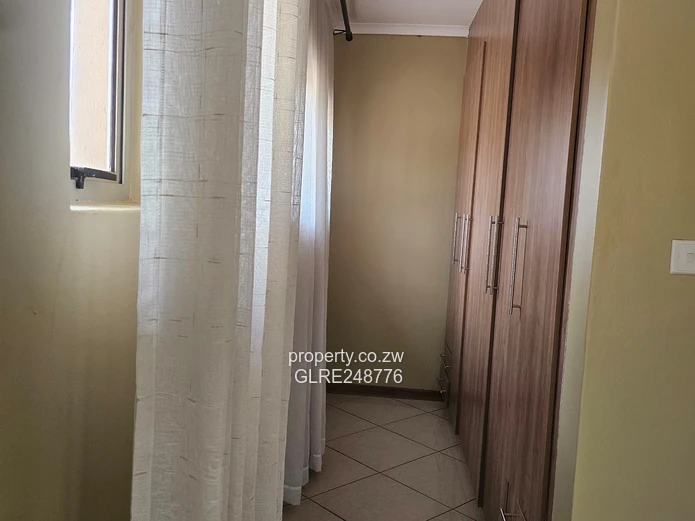 3BR Greendale Flat with Built-in Wardrobes, Borehole & Parking