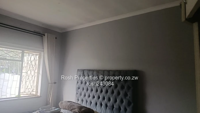 Avondale 2-Bed Garden Flat — Verandah & Borehole