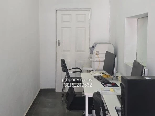 Harare CBD Office: Secure Walled Property with Paved Yard