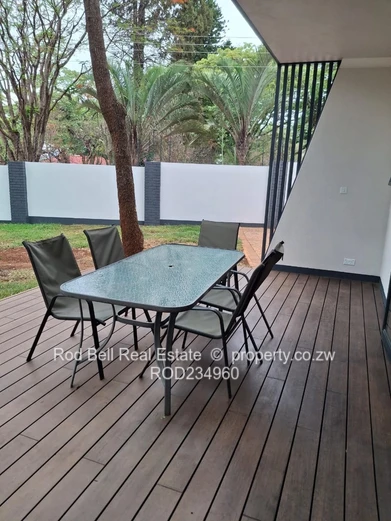 Chisipite 2-Bed Townhouse — Pool, Garden & Balcony