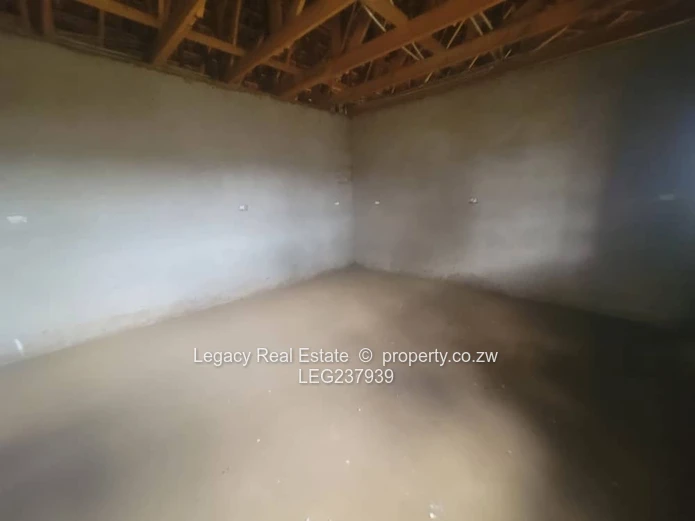 Prime Residential Plot with 4-Bedroom House to Complete