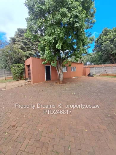4-Bed Hillside Home on 1,237m² with Borehole & Garage