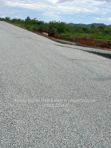 1250m² Bindura Stand — Tar Road, Water Tanks & Views