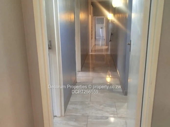 Chisipite 4-Bed Home on 2540m² — Borehole & Double Garage (Sole Mandate)