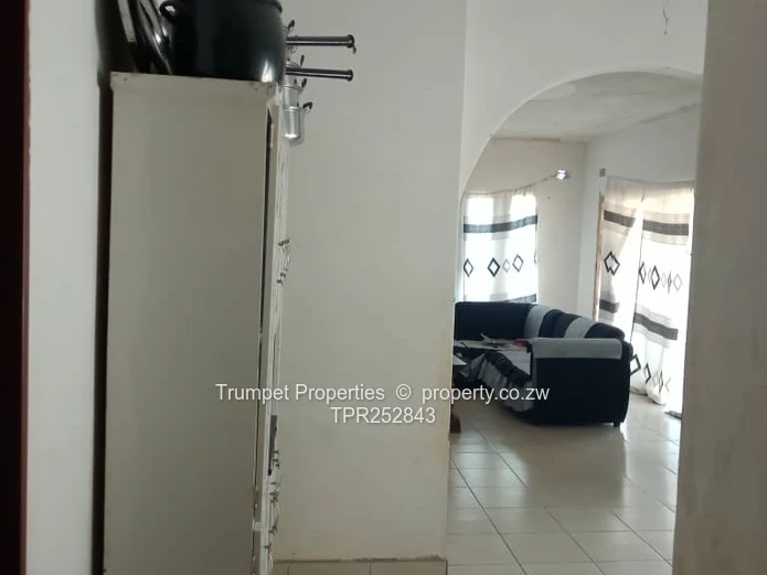 Spacious 4-Bed Brick Home with Verandah & Garage