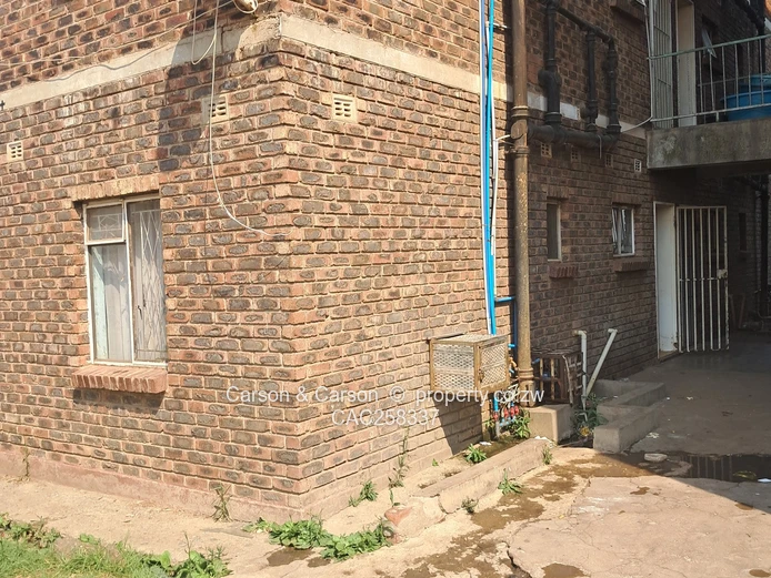 Mufakose 2 bedroom flat lounge fitted kitchen combined toilet and bathroom on ground floor 