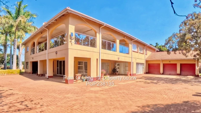 A grand palatial home- 8 bedrooms, 6 en-suite, Borehole, triple garages