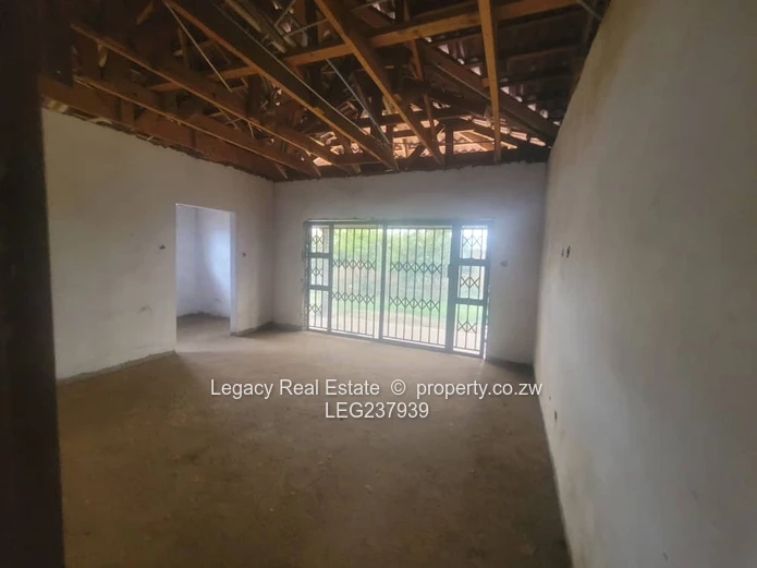 Prime Residential Plot with 4-Bedroom House to Complete