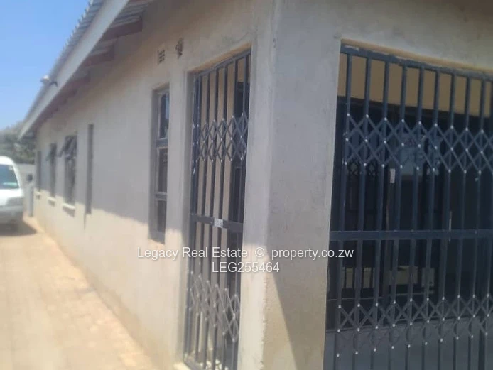 Walled 4-Bed Budiriro Home with Iron Gates & Borehole