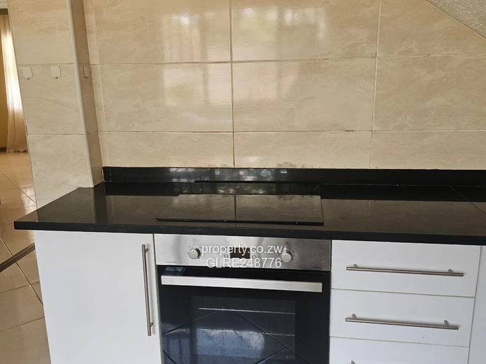 3BR Greendale Flat with Built-in Wardrobes, Borehole & Parking