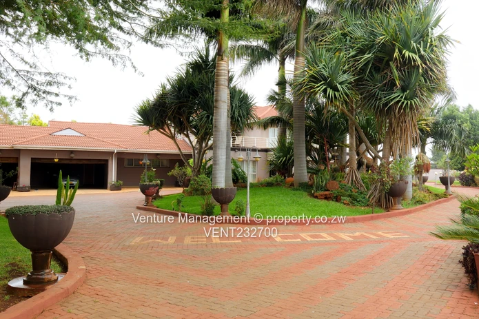 Immaculate 6 Bedroom Mansion with Cottage, Pool & Solar!
