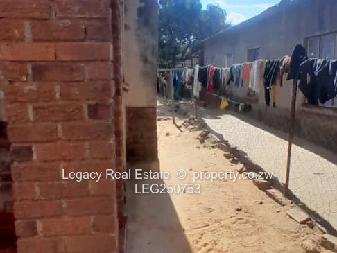 Brick 4-Bed Home with Verandah & Walled Yard