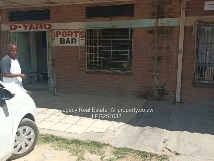 Tiled, High-Ceiling Retail Shop with Service Hatch — Chitungwiza