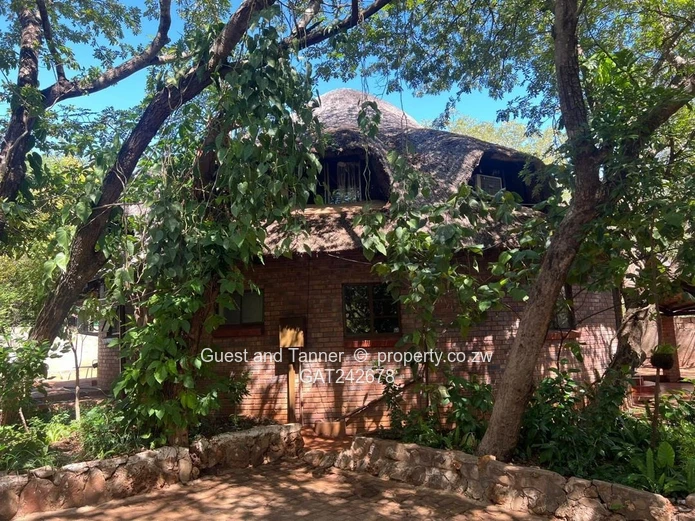 Ten bedroomed lodge under thatch for sale 