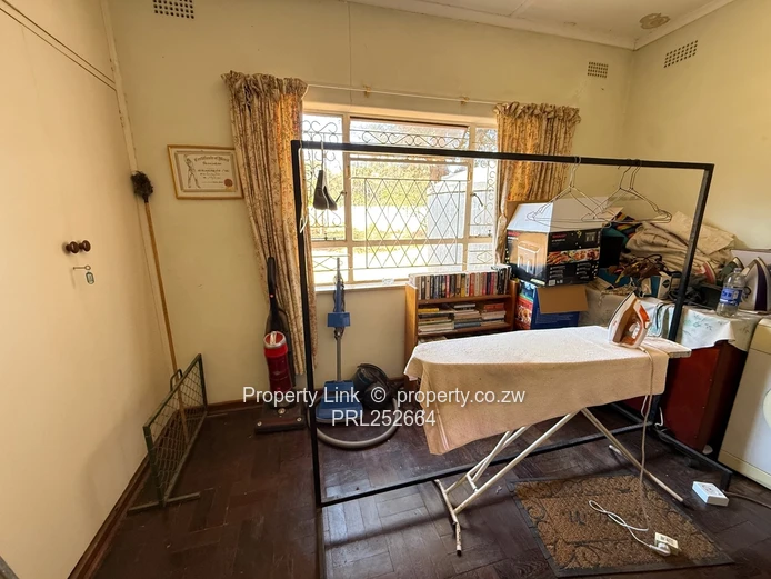 Double Entrance Corner Property With Potential!