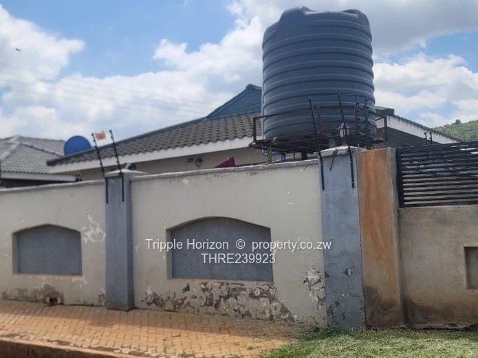 5-Bed Warren Park Home with Tank, Secure Paved Yard