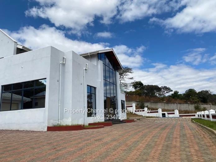 Exclusive 1.4ha Borrowdale Estate - Modern Stands & Clubhouse