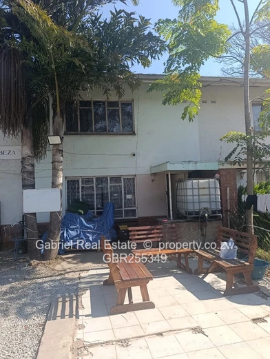 Prime Masvingo CBD Office/flat currently being used as a Driving school, Car wash and restaurant.