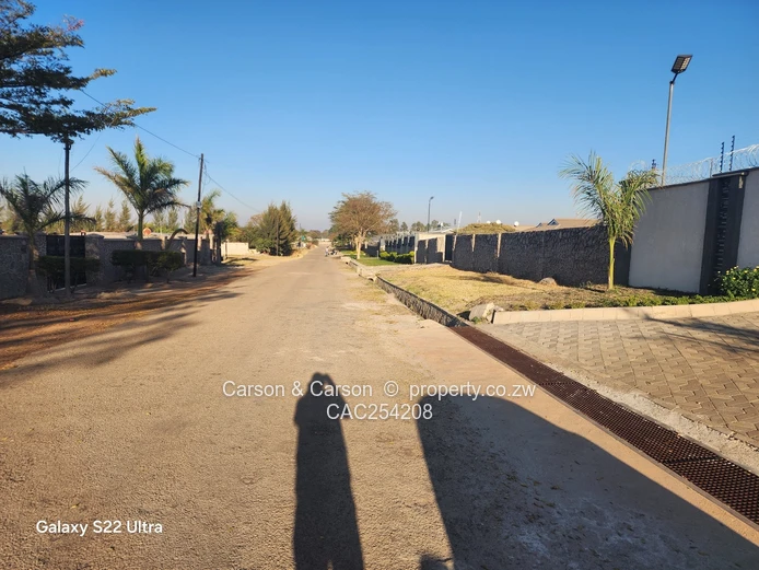 2000m² Waterfalls Stand — Tarred Main Road, Walled Plot