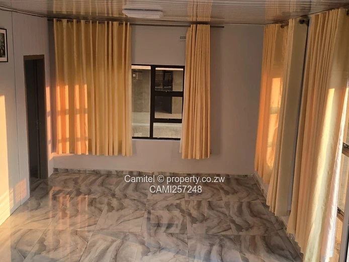 Sunlit 2-Bed Cottage Arlington — 2000m² Plot + Borehole