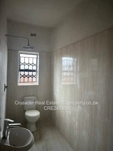 Modern 2-Bed Flat in Tynwald — Borehole & Built-ins (Sole Mandate)