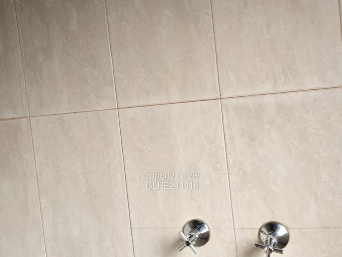 Tiled 2-Bed Kuwadzana Home — Borehole & Parking