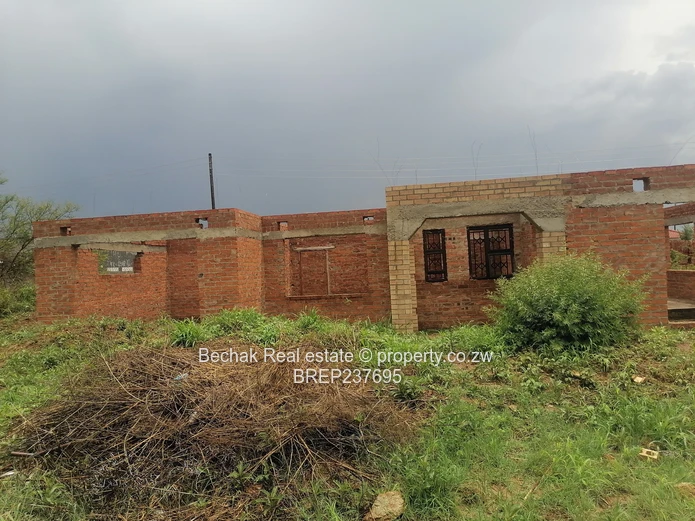 4-Bed Reigate Brick Shell on Main Road