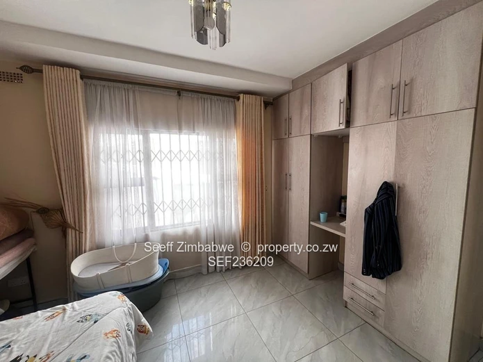 Neat 4-Bedroom Home with Modern Finishes and Excellent Security Features