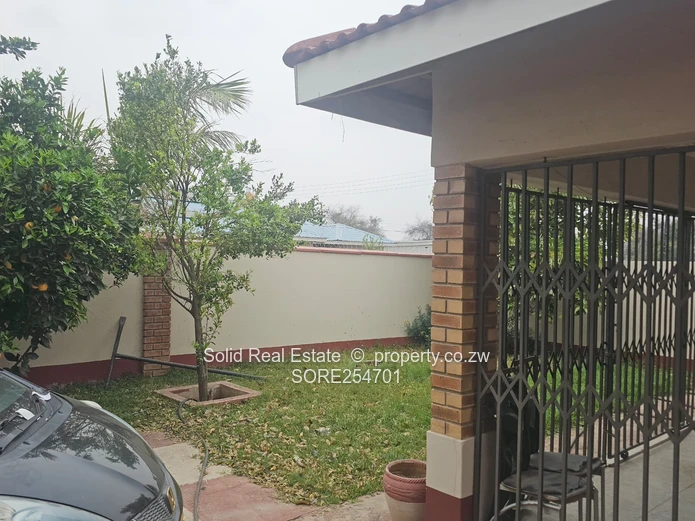 Reigate 3BR Brick Home with Borehole & Checkerboard Courtyard