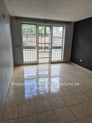 Harare CBD Avenues: 2-Bed Flat 80sqm — Borehole & Paved Yard (Sole Mandate)