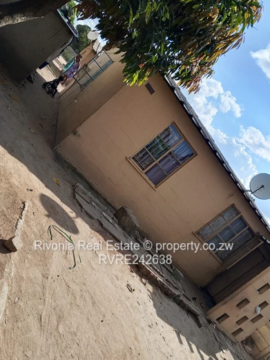 Modest 2-Bed Glen Norah Home with Satellite Dish