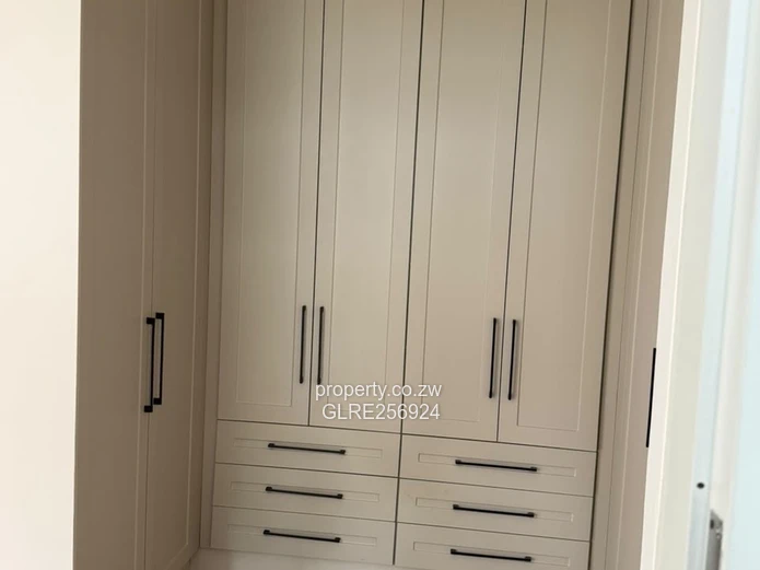 Modern 3-Bed Flat in Borrowdale with Verandah & Solar