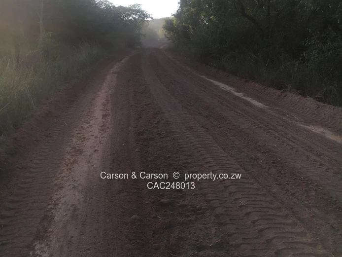 50ha Mhangura Farm — Red Gravel Roads, Dam & Arable Land