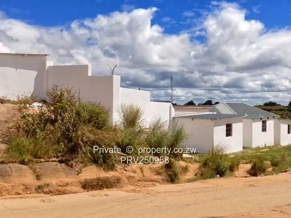 Walled White 14 m² Shop on Domboshawa Road
