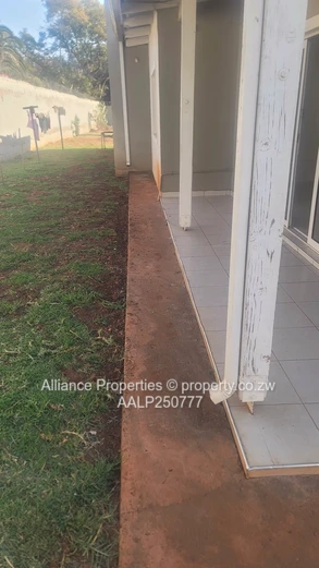 Spacious 2-Bed Ground Floor Flat with Borehole & Garden
