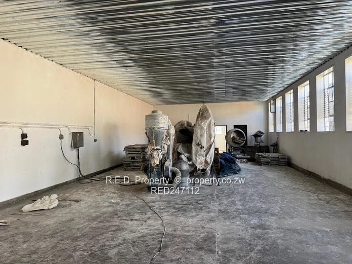 Large-Scale Commercial Property with Extensive Warehouse and Business Space In Belmont!