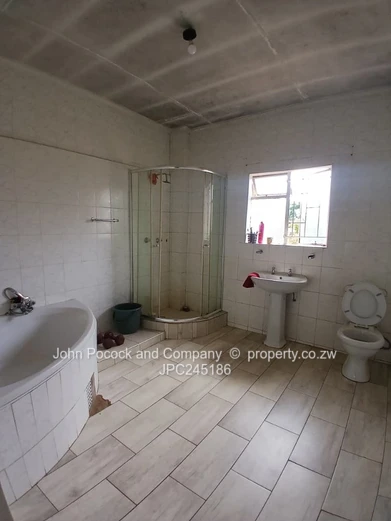 Unlock the Potential of This Well-Located Family Home!