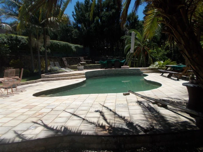 This property offers 2 homes and is set amongst stunning msasa trees