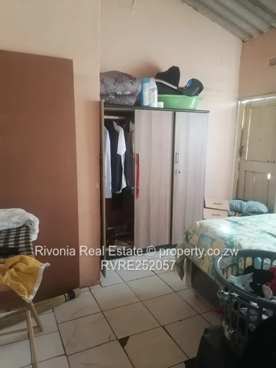 2-Bed Tiled Home with Walled Yard & Access Control