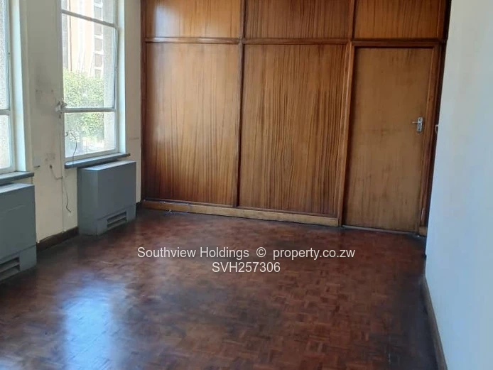 3 neat interconnecting offices plus strong room to let. 
