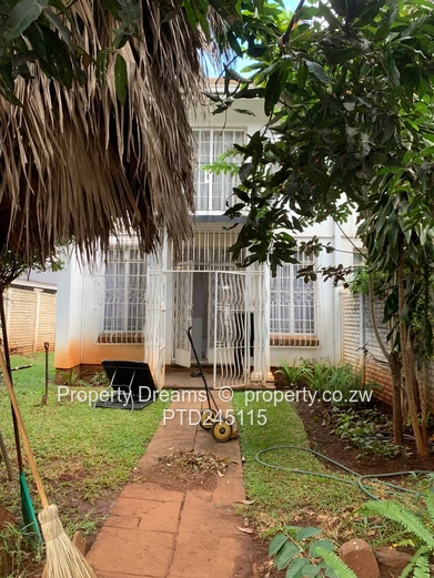 Harare CBD 2-Bed Garden Flat — Updated Kitchen & Borehole