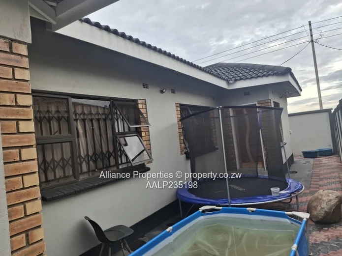 Modern 4-Bedroom Home with Income-Generating Flatlet