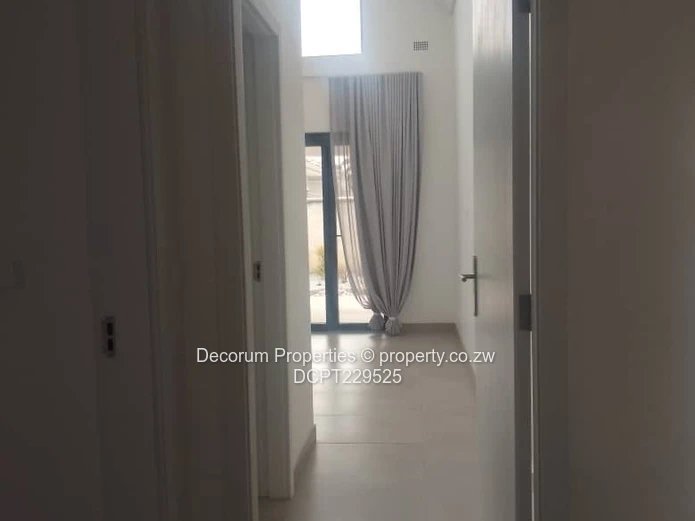 Spacious 4-Bedroom Double- storey Home with Borehole in Borrowdale for Rent!