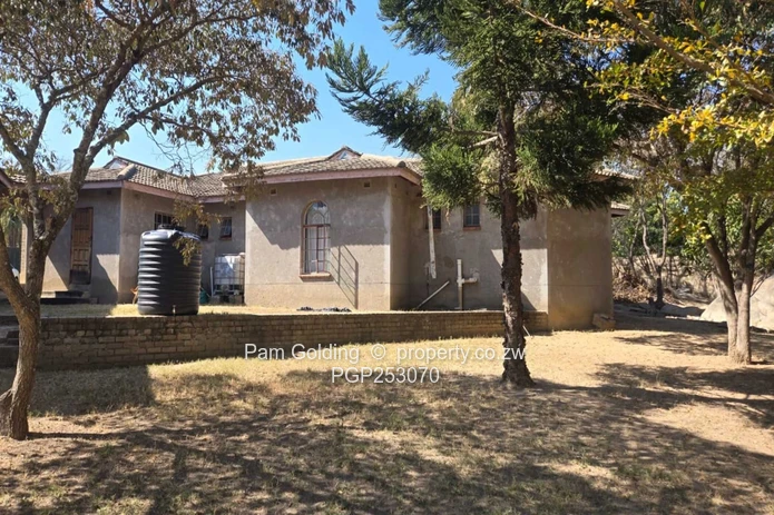 Incomplete 4-Bedroom House On An Acre