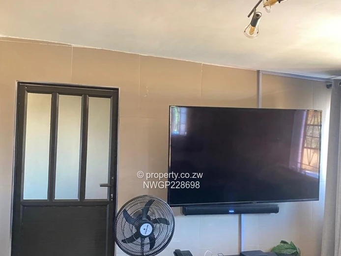 **Modern 2-Bedroom Flat with Solar and Water Tank in Mpopoma**