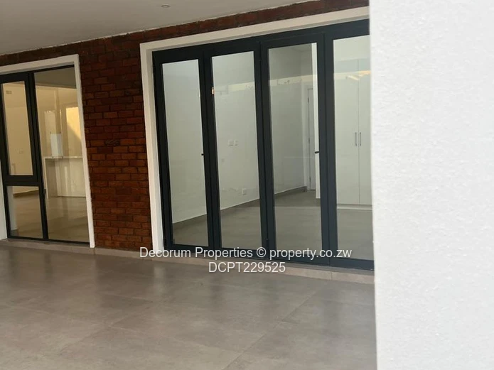 Spacious 4-Bedroom Double- storey Home with Borehole in Borrowdale for Rent!