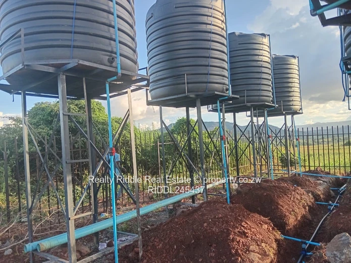 1250m² Bindura Stand — Tar Road, Water Tanks & Views