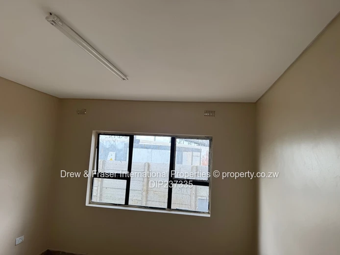 Walled Harare CBD Office with Paved Parking & Boardroom