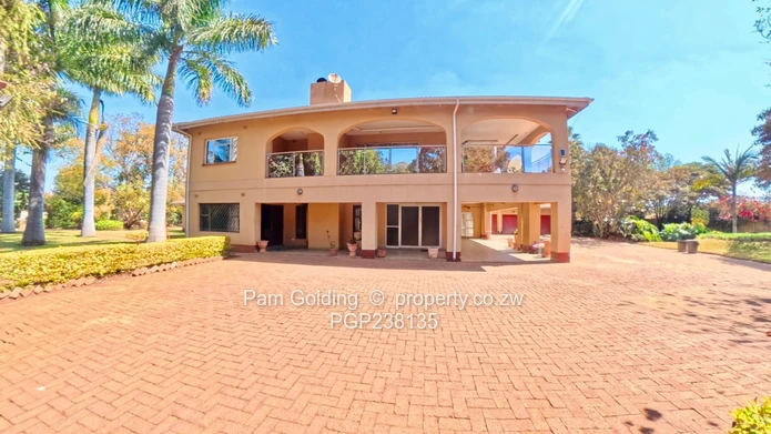 A grand palatial home- 8 bedrooms, 6 en-suite, Borehole, triple garages